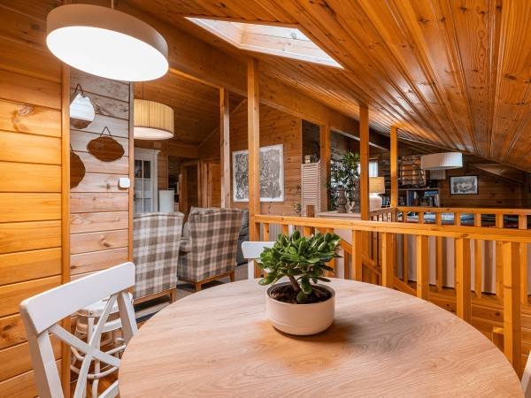 dining-room-cozy-wooden-house-rural-style-room-with-table-chairs-cupboard-decoration